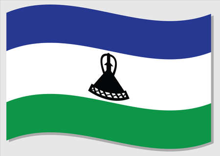 Waving flag of Lesotho vector graphic. Waving Basotho flag illustration. Lesotho country flag wavin in the wind is a symbol of freedom and independence.のイラスト素材