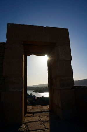 view of the nile river in Aswan in Egypt from an old ruined templeの写真素材