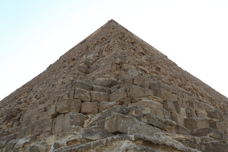 Low angle view of one of the great historical pyramids of Giza, one of the Seven Wonders of the...
