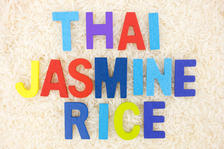 The word JASMINE RICE written in rice grain for background.の写真素材