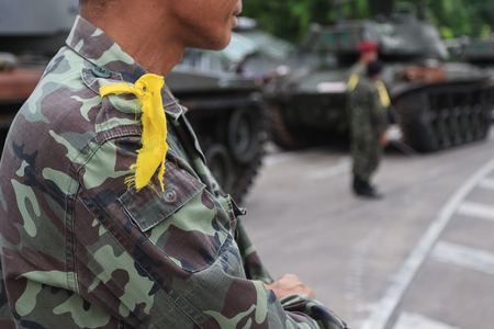 Soldier with military tank background.の写真素材