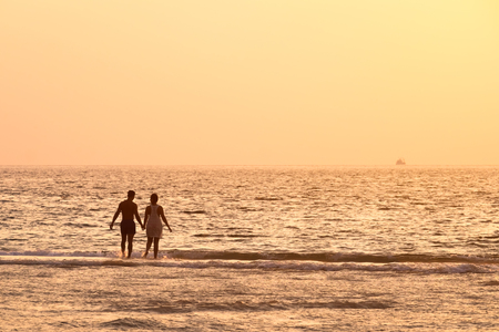 Silhouette of Romantic couple on the beach, Phuket, Thailand.の写真素材