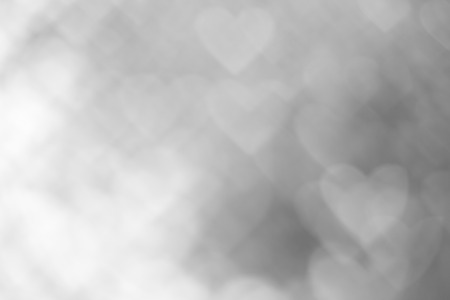 Abstract background heart shape bokeh in black and white tone.の写真素材