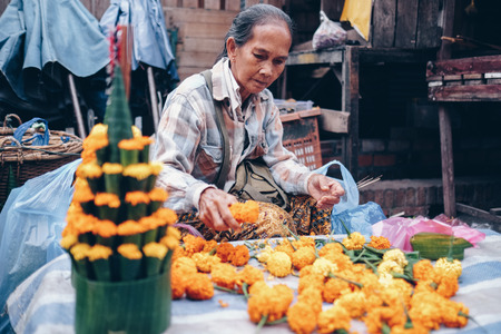 LUANG PRABANG, LAOS - DECEMBER 05 2016: Morning Market in Luang Prabang. The Morning Market is local market selling raw food and popular market for tourists.のeditorial素材
