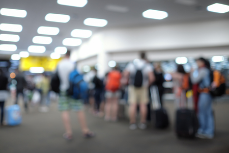 Airport blur background with traveling passengerの写真素材
