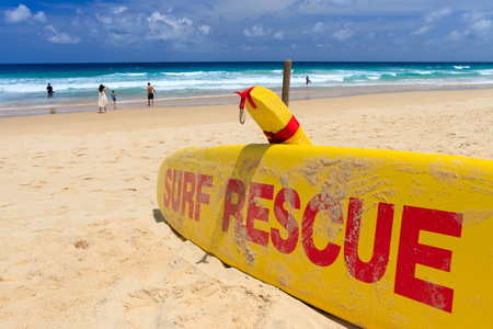 Yellow surf rescue board by the sea beach.の写真素材