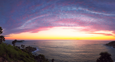 Panorama view point - Phromthep cape with cirrostratus cloud and dramatic sunset sky, Phuket Island,Thailand.の写真素材