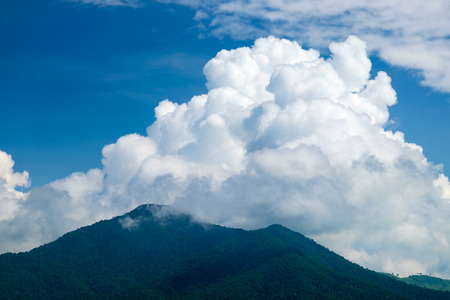 Big cloud over hills.の写真素材