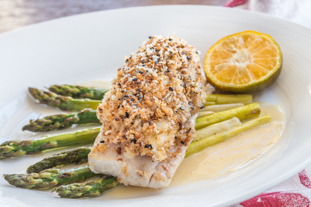 Crab and pumpkin crusted Mahi Mahi with asparagus and Calamansi butter