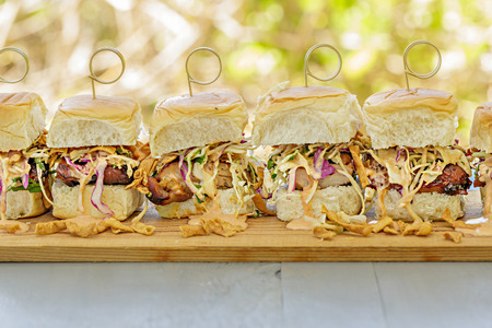 Char siu chicken, slaw and dressing on Hawaiian sweet slider bunsの写真素材
