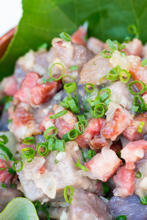 A simple Hawaiian hash made with local taro, thick bacon, green onions and seasoningの写真素材