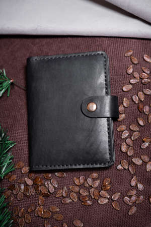 Leather passport cover close up on brown background