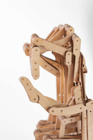 Hand of wood and plywood on a white background close-upの写真素材