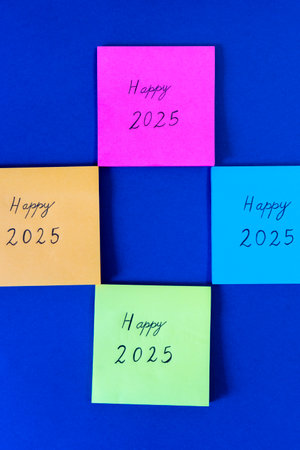 Happy new year 2015 and happy new year 2015 on colorful sticky notes