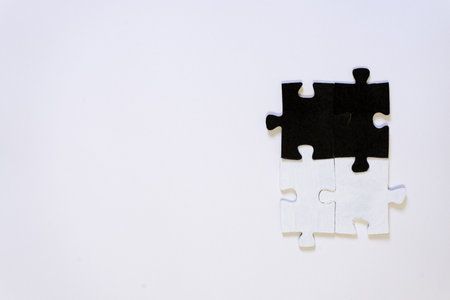Puzzle pieces isolated on white background. Top view. Copy space.