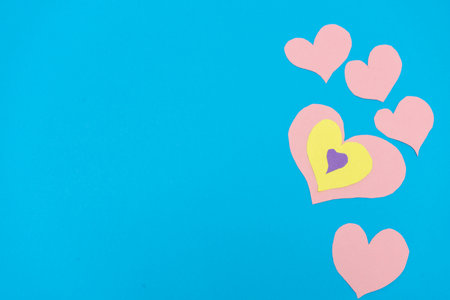 group of pink hearts on a blue background horizontal valentine background . Valentine's Day conceptの写真素材