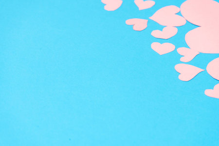 Pink hearts on a blue background horizontal. Valentine's Day conceptの写真素材