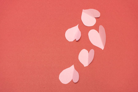 group of pink hearts on a red background horizontal valentine background . Valentine's Day conceptの写真素材