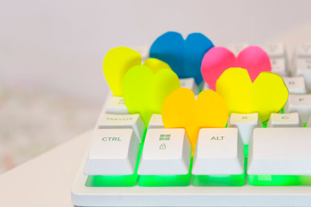 Colorful heart shape on computer keyboard for valentine's dayの写真素材