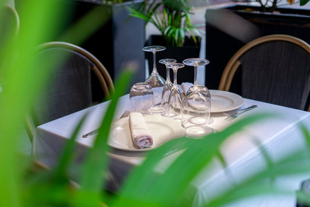 Table set for an event party or wedding reception in a restaurant.の写真素材
