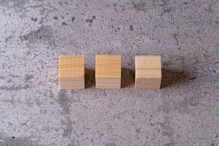 Wooden blocks on concrete background. Business concept. Top view.の写真素材