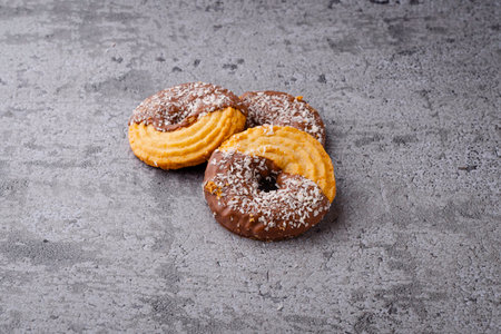 Chocolate donuts on grey background, copy space for text.の写真素材