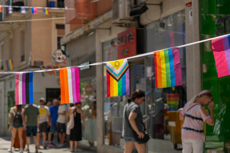 LGBT rainbow flags in the streets of Barcelonaの写真素材