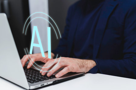Businessman using a laptop with artificial intelligence (AI) concept.の写真素材