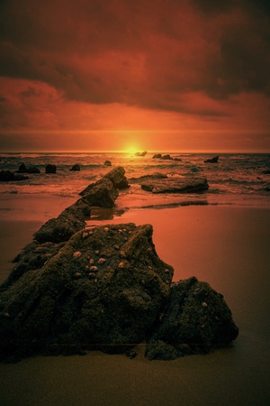 the sunset in the beach in the coastの写真素材