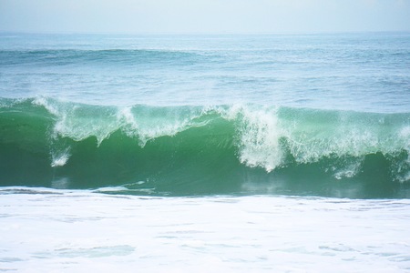 waves in the blue ocean in the coastの写真素材