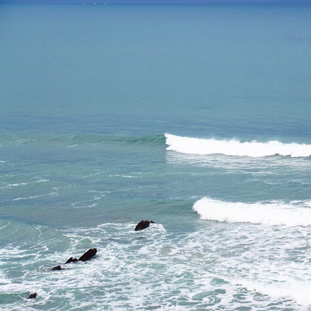 rocks and waves in the water in the seaの写真素材