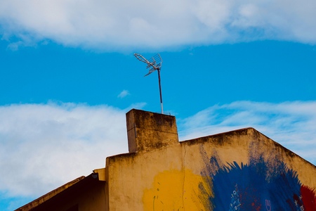 television aerial on the rooftop building, antenna on the roof in Bilbao city. Spainの写真素材
