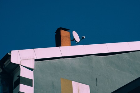 television aerial on the rooftop building, antenna on the roof in Bilbao city. Spainの写真素材