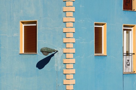 window on the blue facade in Bilbao city. Spain.の写真素材