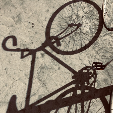 bicycle transportation shadow silhouette in the streetの写真素材