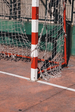 soccer goal rope net in the field in the street