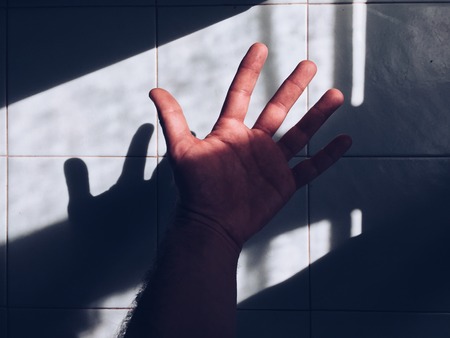 hand shadow in the shadowsの写真素材