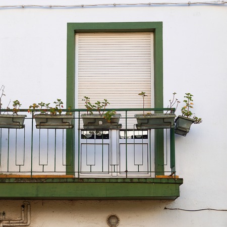 window in the white building facade in Bilbao city Spainの写真素材