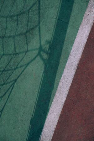 white lines on the soccer field ground in the streetの写真素材