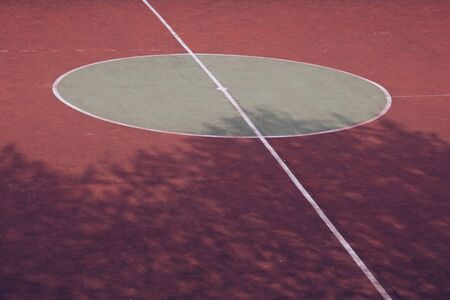white lines on the soccer field ground in the street