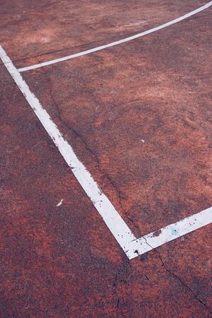 white lines on the soccer field ground in the streetの写真素材