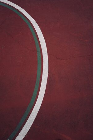 white lines on the soccer field ground in the streetの写真素材