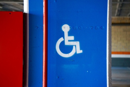 wheelchair traffic sign on the road in the street
