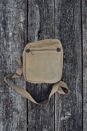 brown bag on the wooden tableの写真素材