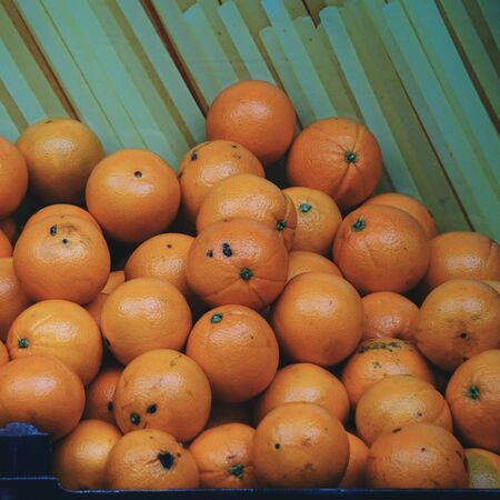 orange fruit in the market, healthy food and tasty fruitの写真素材