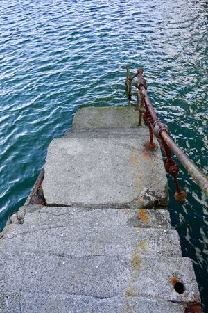 old abandoned stairs in the seaport on the street in Bilbao city spainの写真素材