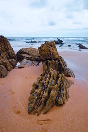 rocks and sea and cliff in the coast in Bilbao Spainの写真素材