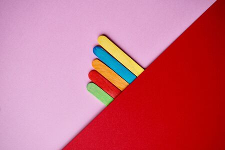 colorful wooden sticks decoration, multi colored background