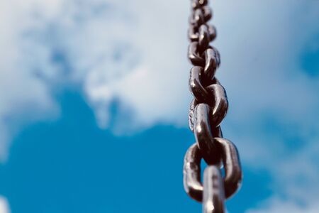 metallic chain and blue sky