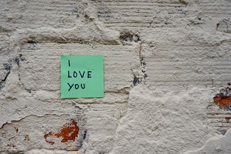 i love you message hand written on paper for valentine's day